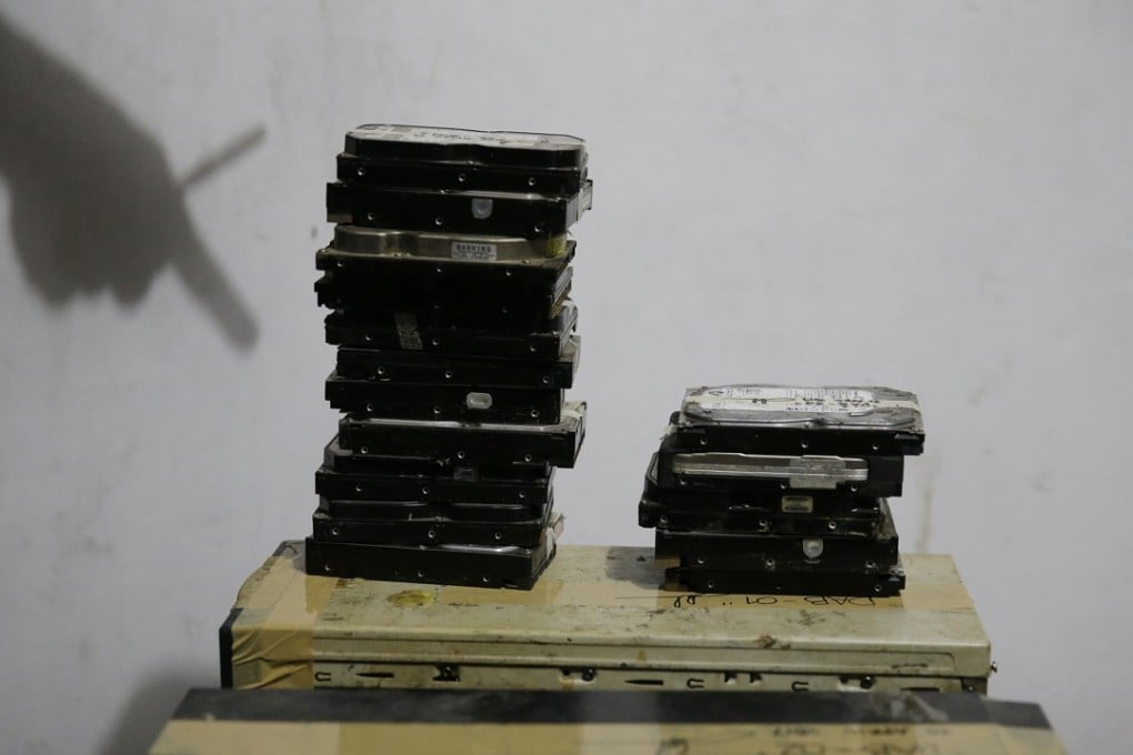 Computer hard drives seized during a raid on the home of suspected child webcam sex operator David Timothy Deakin. Photo: AP