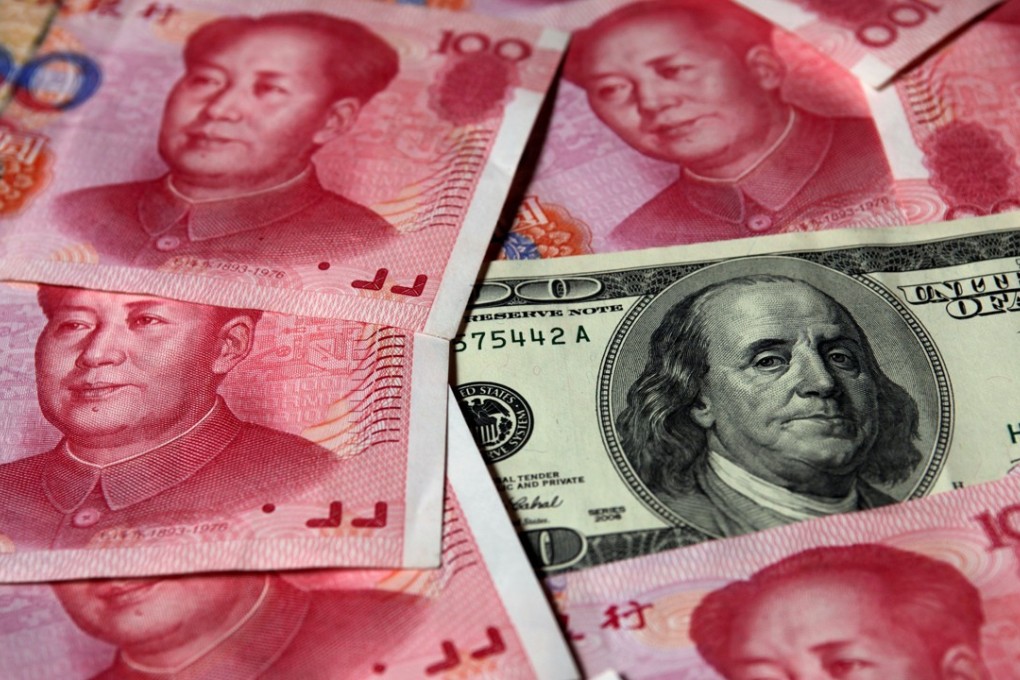 The People’s Bank of China on Wednesday set the yuan reference rate at 6.9066 to the US dollar, 0.04 per cent weaker than on Tuesday. Photo: Reuters