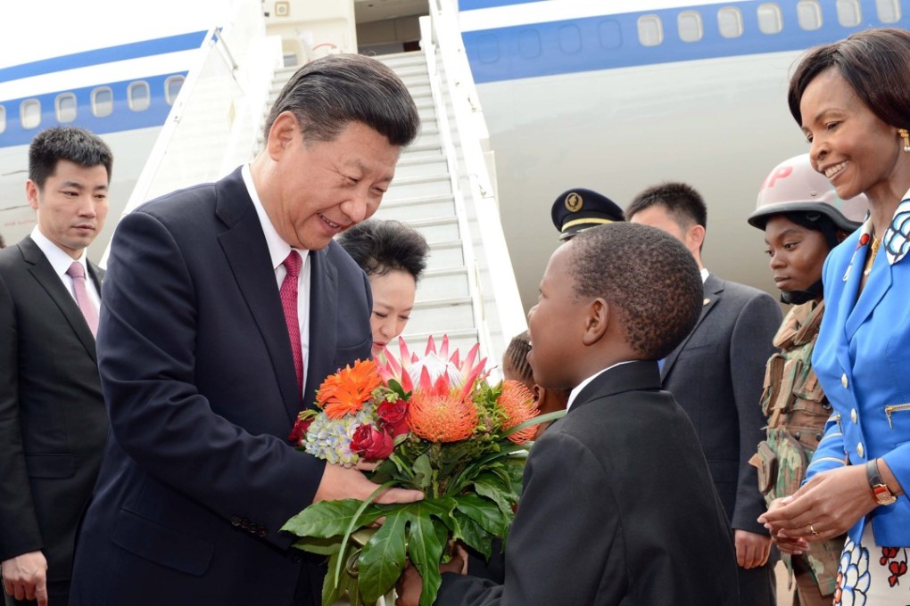 President Xi Jinping is greeted at Pretoria’s Waterkloof Air Force Base at the start of a state visit to South Africa in December 2015. Photo: EPA