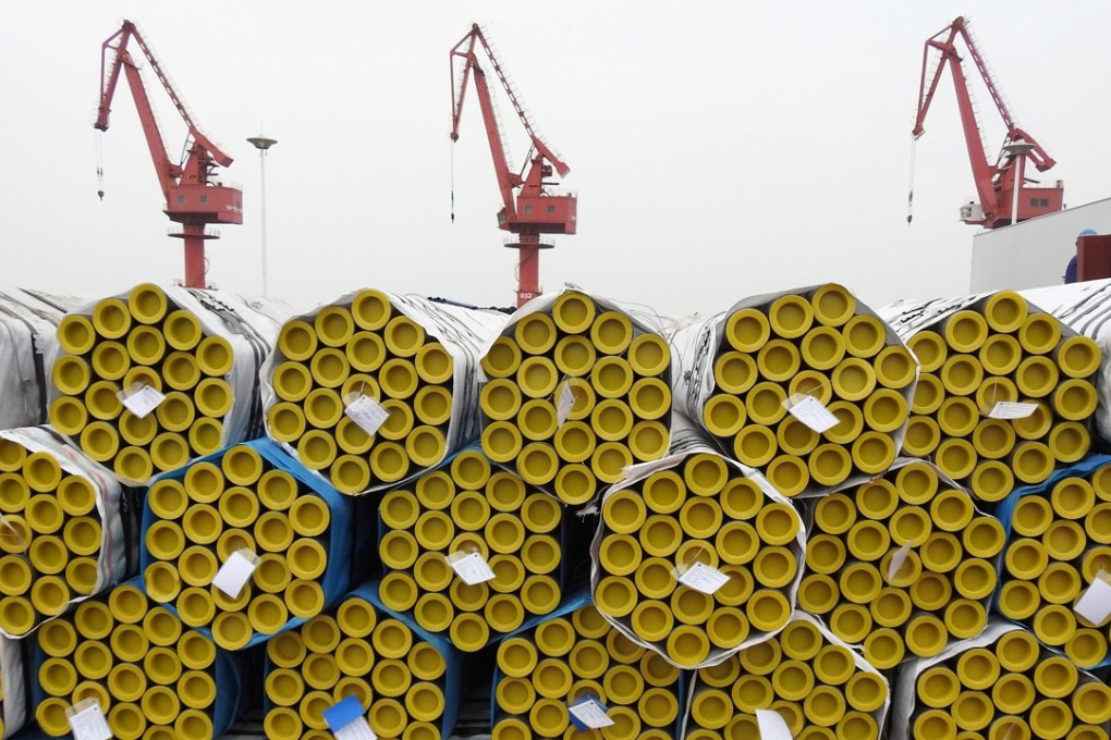 Steel pipes are seen before being loaded for export at Lianyungang port, Jiangsu province, China. Steel capacity may be reduced in China in 2017, but excess production is here to stay, an industry official in Europe said. Photo: Reuters