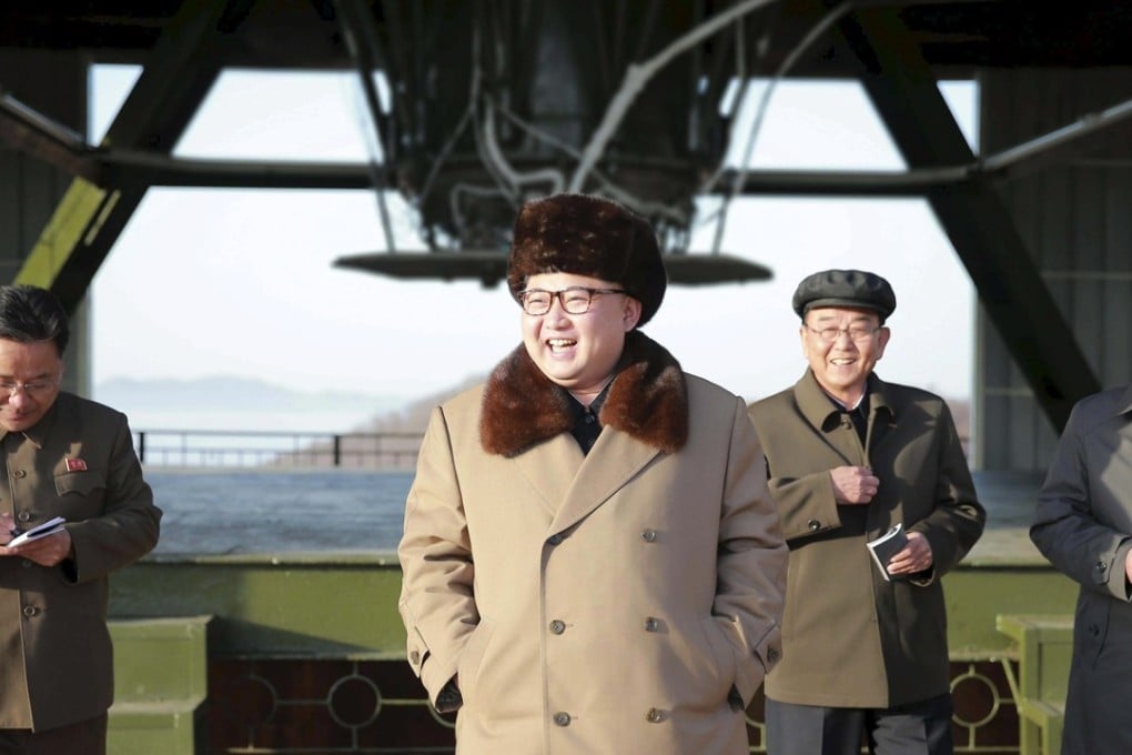 A very pleased Kim Jong-un visits the Sohae Space Centre in North Pyongan province for the testing of a new engine for an intercontinental ballistic missile, in April last year. Photo: KCNA/Reuters