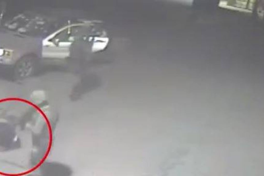 Mexican soldiers stand over a detained man (circled), moments before he is shot in the head, in a video that has sparked outrage. Photo: LiveLeak