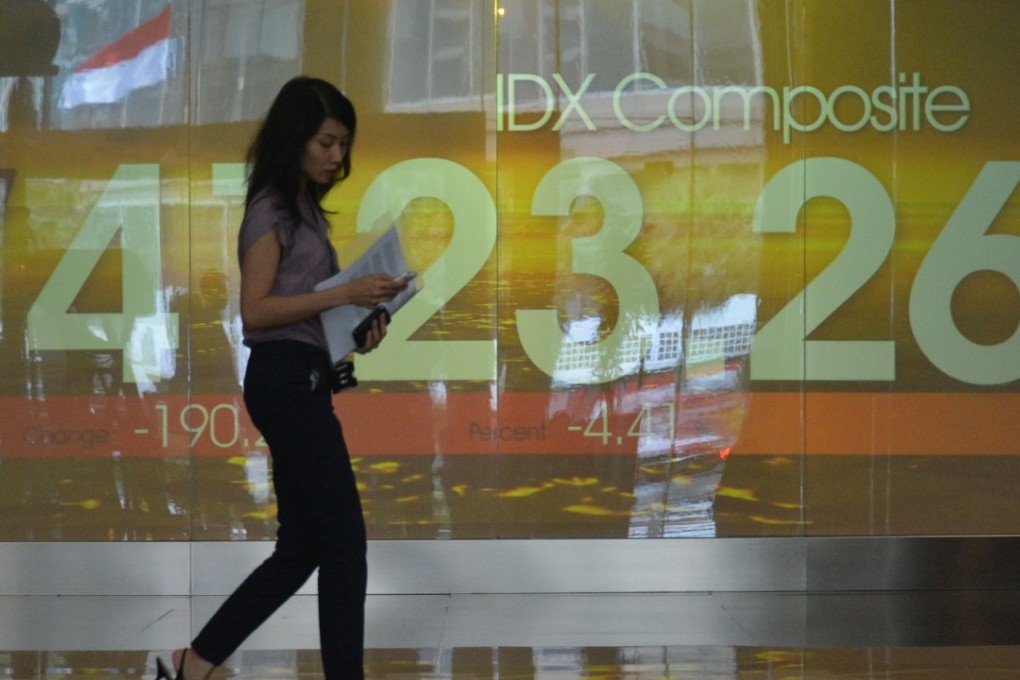 An Indonesian stock exchange display board in Jakarta. Photo: AFP
