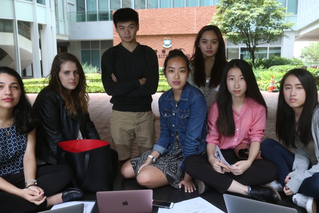 (From left) Students Siya Kulkarni, Emily Anderson, Johnson Phan, Kerry Lin, Kathleen Magramo, Bvelyn Zheng Yining and Tiffany Chan Yan Lok, who conducted a study on employment agencies of domestic helpers. Photo: K.Y. Cheng