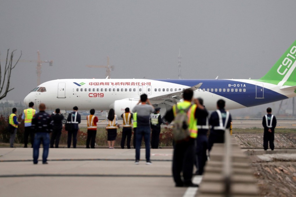 A Chinese C919 passenger jet prepares to take off on its maiden flight at the Pudong International Airport in Shanghai. Photo: Reuters