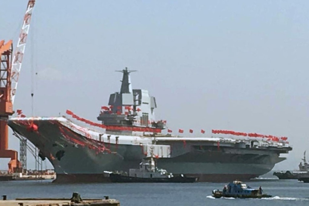 China’s first domestically built aircraft carrier is launched at a shipyard in the northeastern port city of Dalian on April 26. Photo: Kyodo