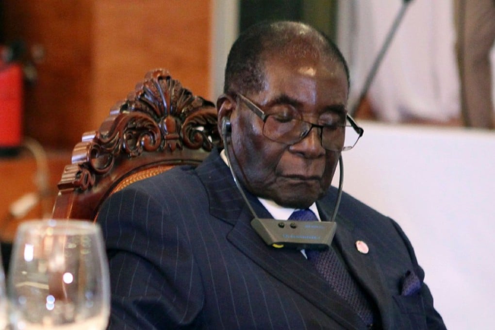 Zimbabwe President Robert Mugabe closes his eyes during a State Dinner for the Africa-France Summit with the Rwandan president in Bamako. Photo: AFP