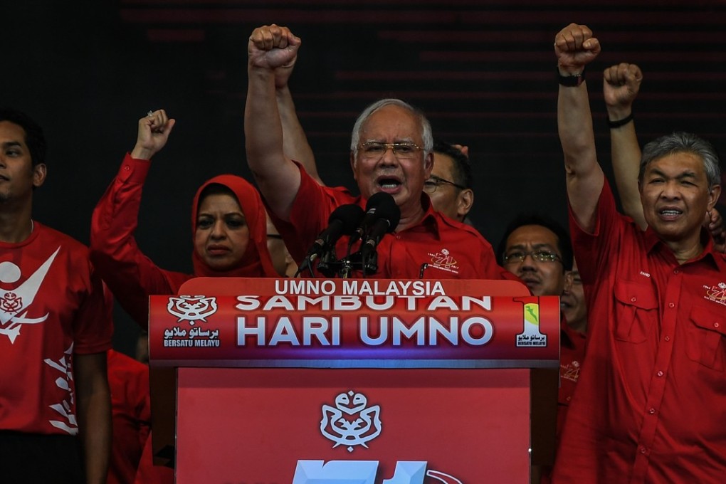 Malaysian Prime Minister Najib Razak rallies supporters at UMNO’s 71st anniversary celebration. Photo: AFP