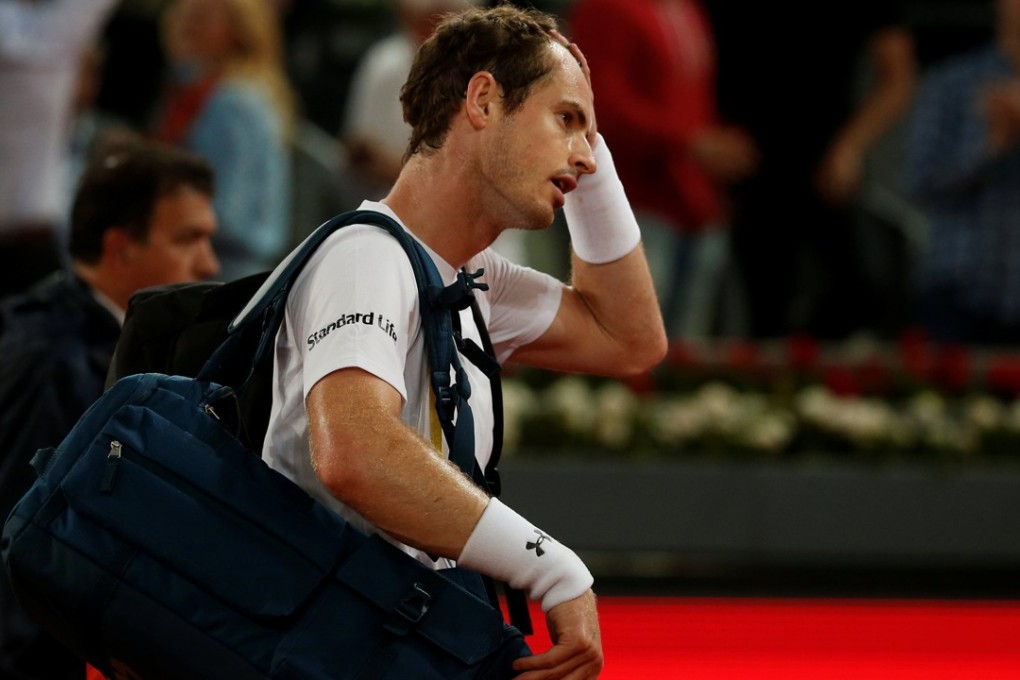 A dejected Andy Murray leaves the court after losing to lucky loser Borna Coric of Croatia. Photo: Reuters