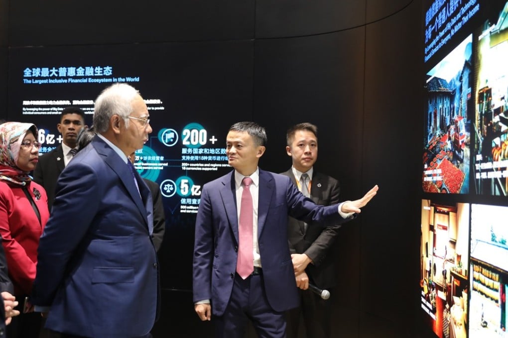 Alibaba Group executive chairman Jack Ma Yun takes Malaysian prime minister Najib Tun Razak and his delegation for a tour of Alibaba's headquarters in Hangzhou. Photo: Alibaba Group
