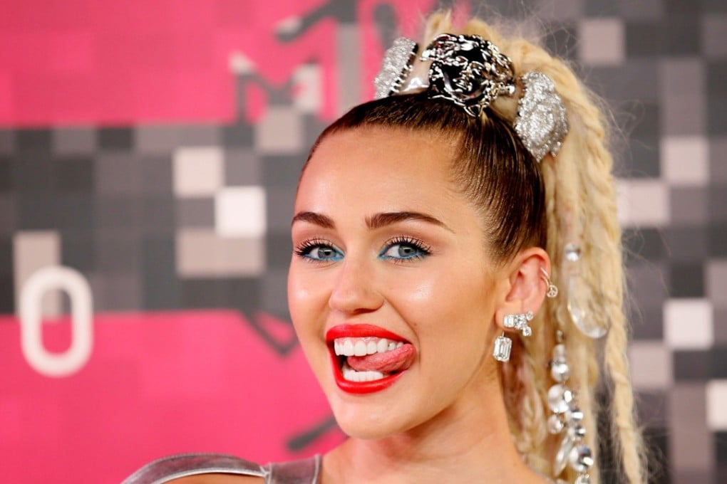 Singer and show host Miley Cyrus arrives at the 2015 MTV Video Music Awards in Los Angeles,. She just released a rock ballad song called Malibu. Photo: Reuters