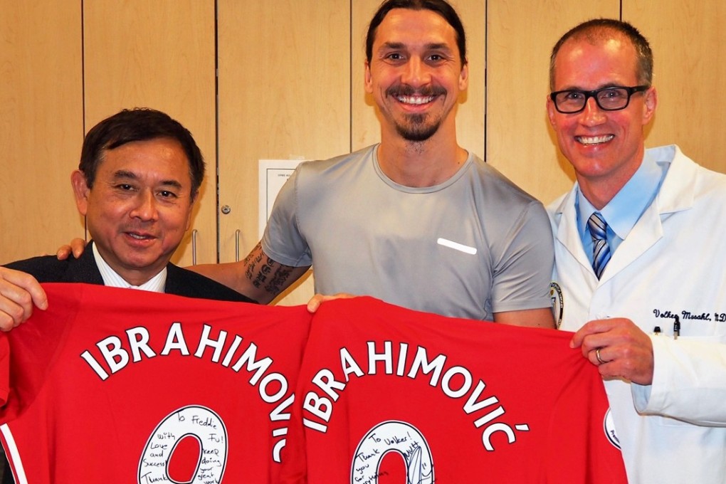 Dr Freddie Fu and fellow surgeon Volker Musahl with Zlatan Ibrahimovic. Photo: Freddie Fu
