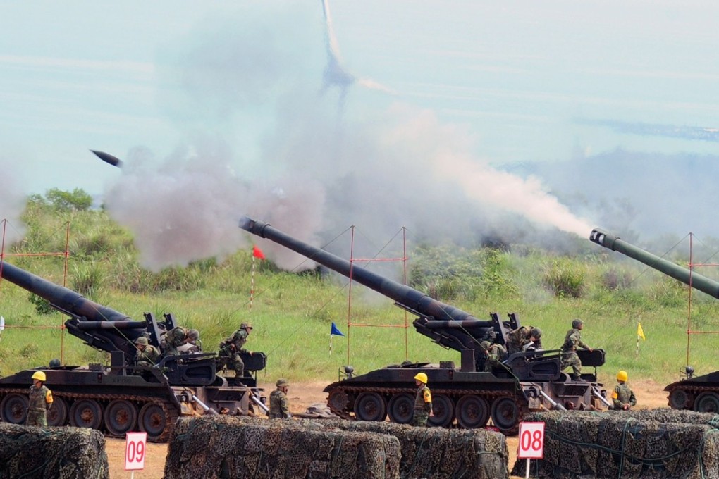 Taiwanese artillery forces conducting a drill. The island has vowed to continue buying arms from the US, despite Chinese opposition. Photo: AFP