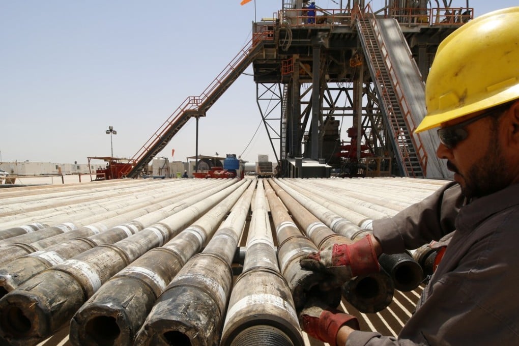 A man works for Iraqi Drilling Company at Rumaila oilfield in Basra, Iraq. US oil major Occidental Petroleum became one of the first companies to approval a shareholder proposal on climate change opposed by management. Photo: Reuters