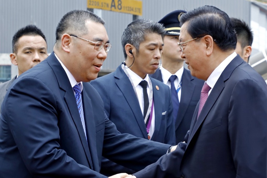 Macau Chief Executive Fernando Chui (left) welcomes Zhang Dejiang. Photo: GCS Macau