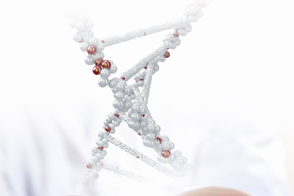 An image of DNA strand against the background with human hands. Photo: Shutterstock