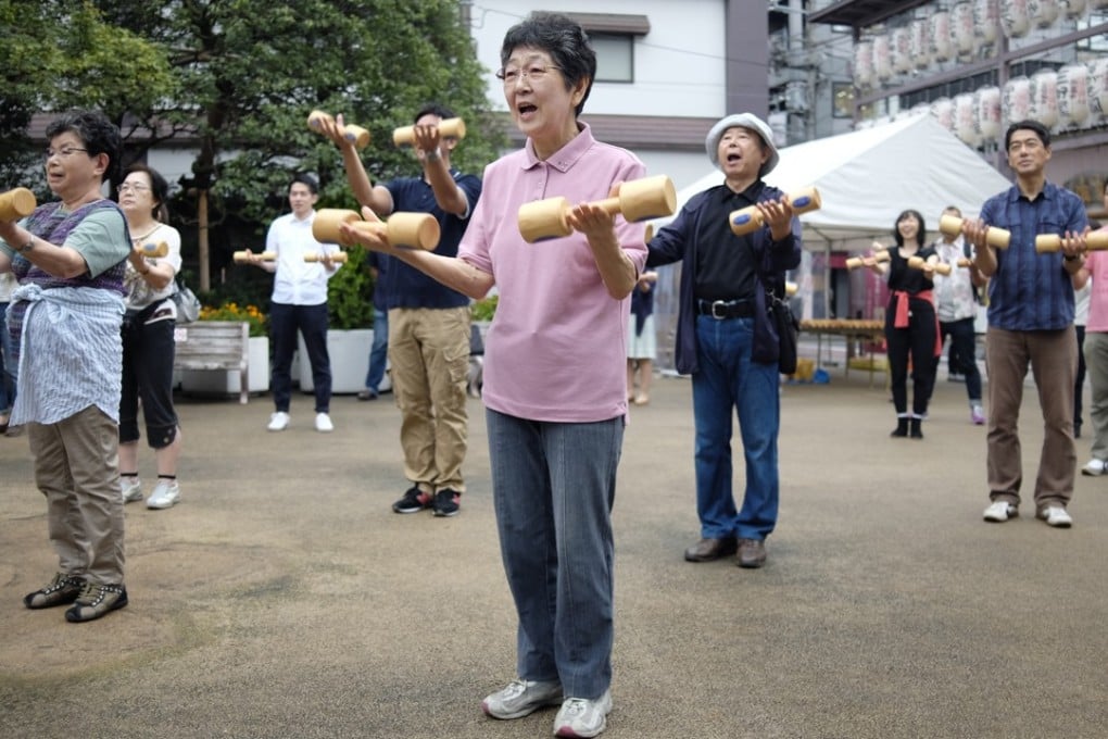 Elderly Japanese work out in a Tokyo park. Photo: AFP
