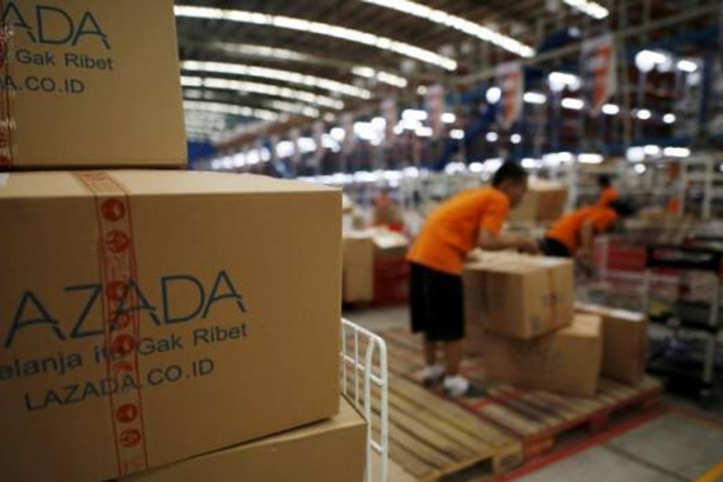 Employees at the online retailer Lazada fill orders at the company's warehouse in Jakarta. Photo: Reuters