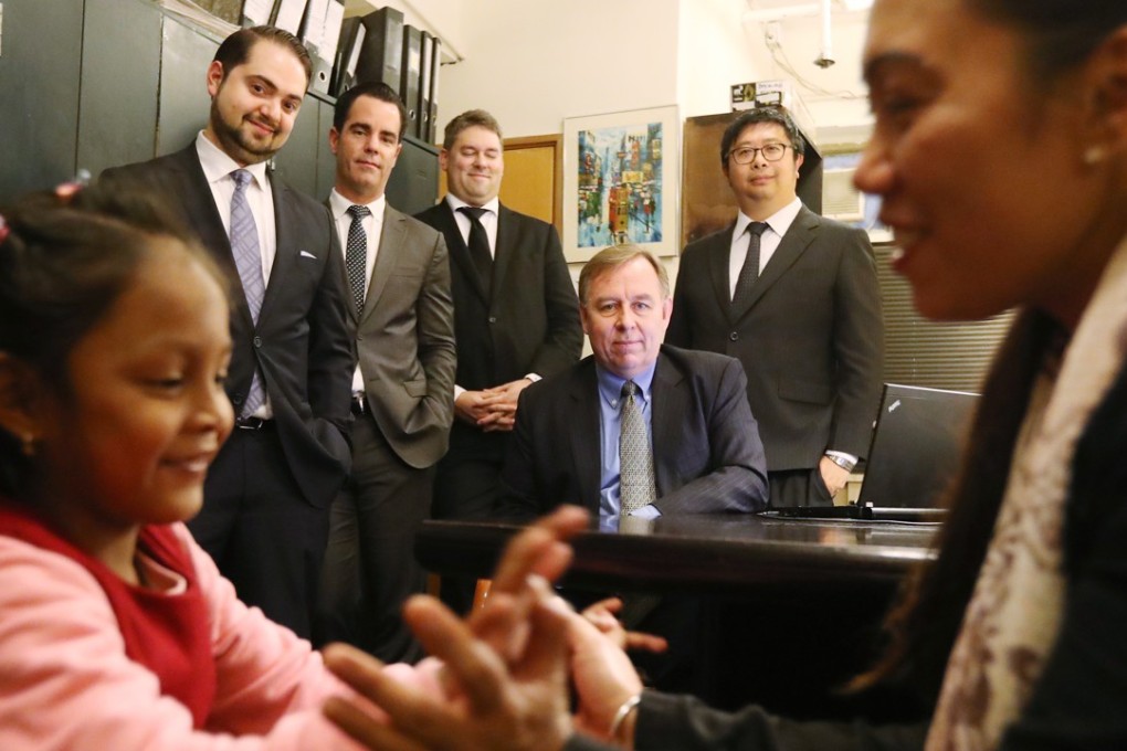 Asylum seeker Vanessa Rodel, front right, with daughter Keana; (back left to right) Marc-André Séguin, Michael Simkin, Francis Tourigny, Edward Snowden lawyer in Hong Kong Robert Tibbo, and Man Ho-ching. Photo: Nora Tam