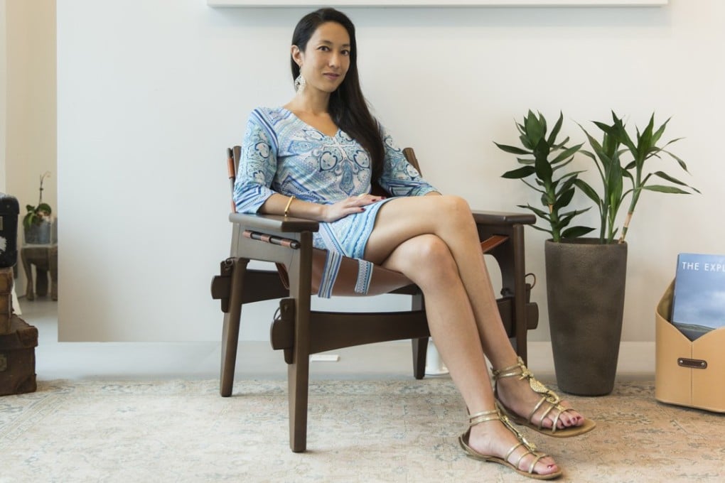 Entrepreneur and wellness expert Vivienne Tang wearing a dress by Emilio Pucci, shoes by Pedder Red, bracelet by Monica Vinader and earrings by Ananda Soul at The Explorer Lounge by Jacada Travel. Photo: Michelle Wong