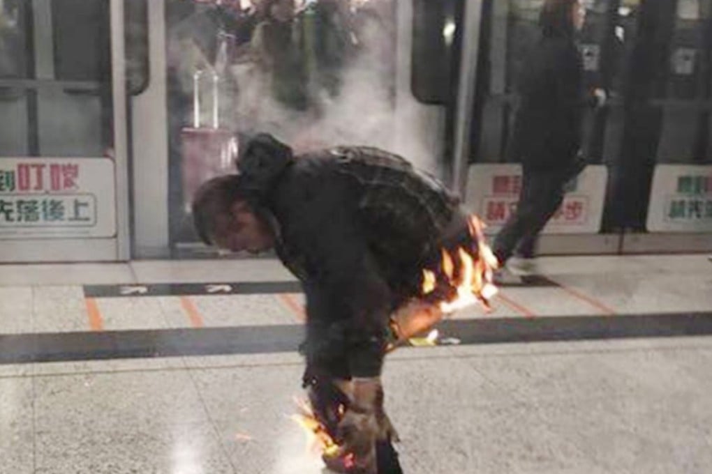 A Facebook photo of the firebombing incident shows the man on fire at Tsim Sha Tsui station. Photo: Facebook