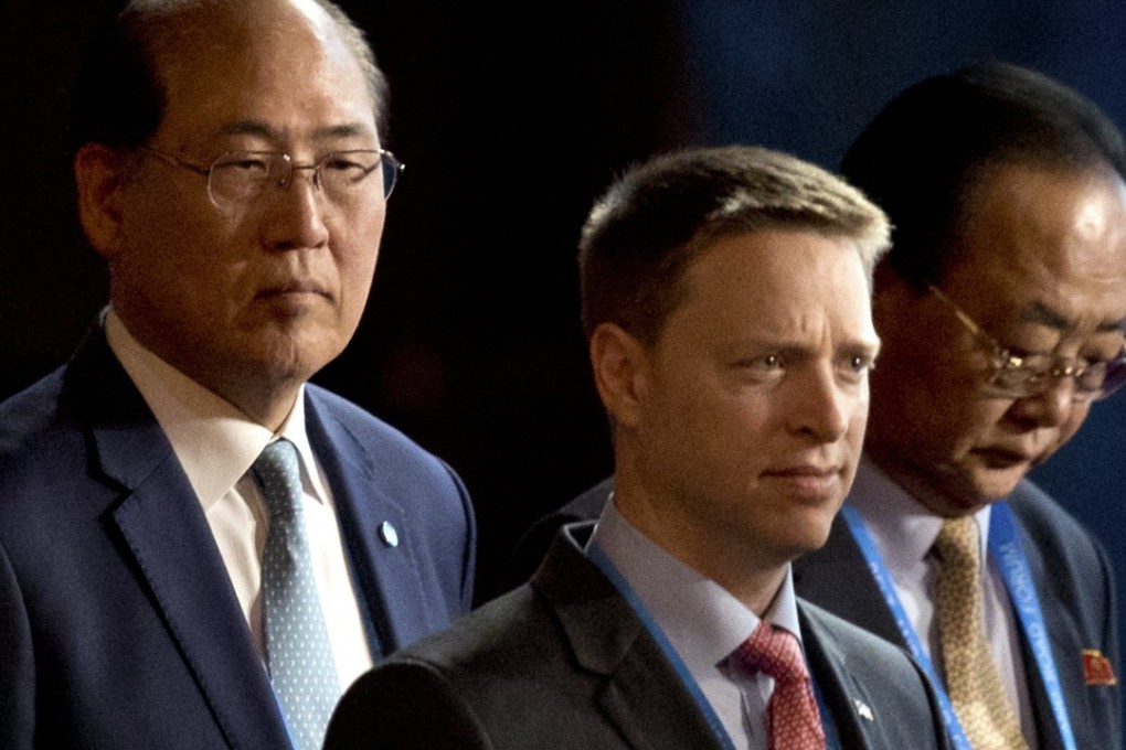 Matt Pottinger (centre), Special Assistant to US President Donald Trump and National Security Council (NSC) Senior Director for East Asia, and Kim Yong Jae (R), North Korea’s minister of external economic relations, arrive for the opening ceremony of the Belt and Road Forum (BRF) at the China National Convention Centre (CNCC) in Beijing, China, 14 May 2017. Photo: EPA