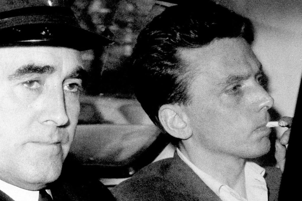 In this file photo dated Oct.ober 1965, Ian Brady, right, is escorted by a police officer to the courthouse in Hyde, England, where he was convicted of the murders of five children. Photo: AP