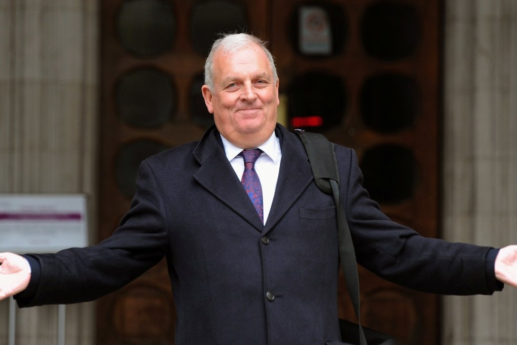 Former Sun newspaper editor Kelvin MacKenzie gestures as he leaves the Leveson Inquiry at the High Court in central London in 2012. Photo: Reuters