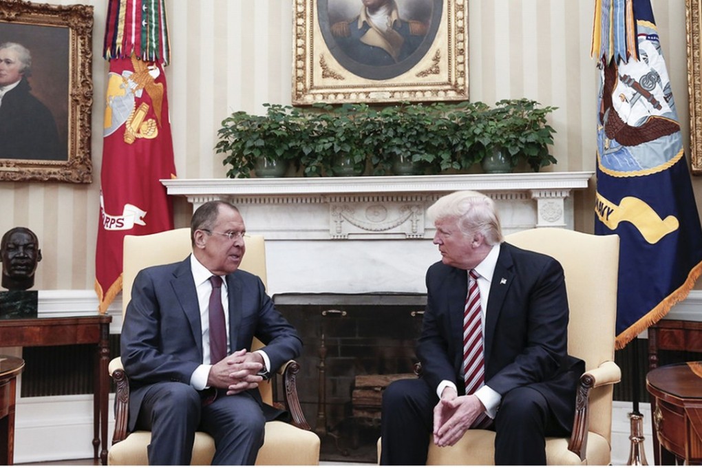 US President Donald J. Trump, right, speaks with Russian Foreign Minister Sergei Lavrov during a May 10 meeting at the White House in Washington. Photo: AFP