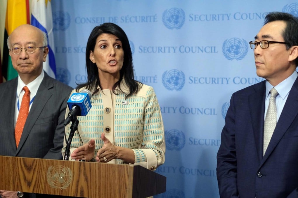US Ambassador to the United Nations Nikki Haley (C) answers a question during a press briefing as Japanese Ambassador Koro Bessho (L) and South Korean Ambassador Tae-yul Cho listen before a Security Council meeting on the situation in North Korea. Photo: AFP