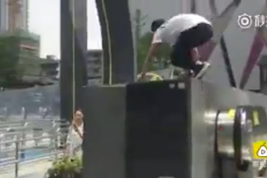 Hou Rong, a Chinese parkour runner races from one subway station to the next to get back on the same train . Photo: SCMP Handout