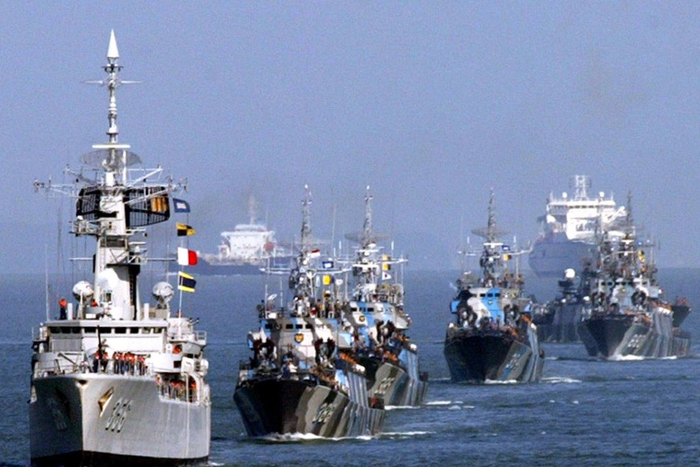 Naval ships from Indonesia, Singapore and Malaysia sail during a ceremony to launch a trilateral coordinated patrol between the three countries in the Strait of Malacca, one of the world's most important shipping lanes more than a decade ago. Singapore is buying two more submarines to boost the strength of its navy. Photo: Reuters