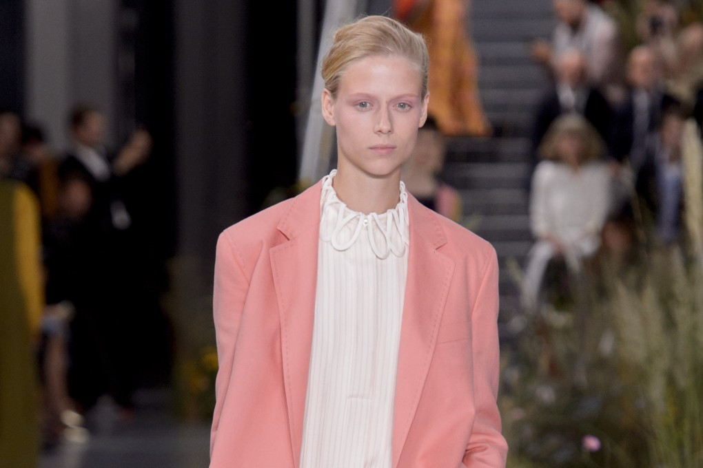 The pink blazer and matching shorts set by Paul Smith is ideal for a day out