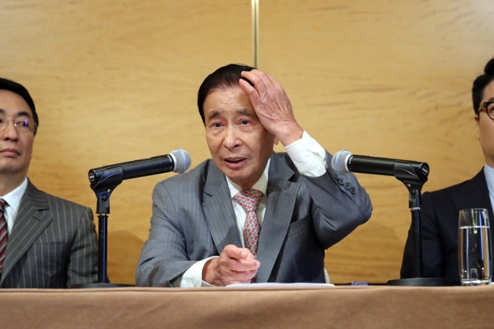 (L-R) Henderson Land Vice-Chairman Peter Lee Ka-kit; Chairman Lee Shau-kee; and Vice-Chairman Martin Lee Ka-shing, attend Henderson Land AGM at the Four Seasons Hotel in Central. Photo: Bruce Yan
