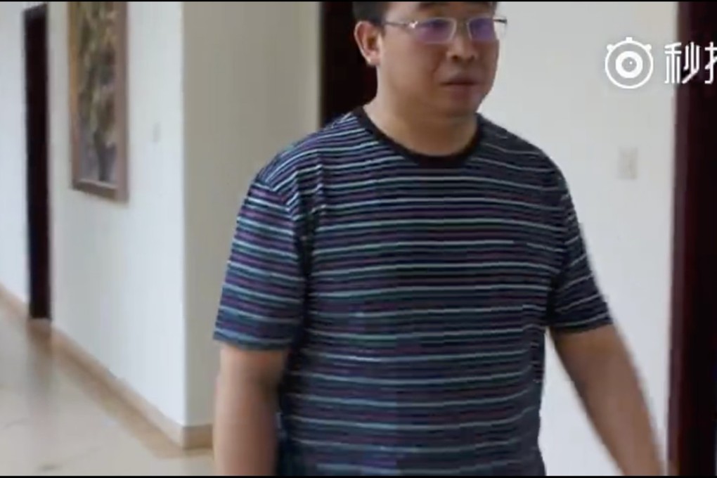 Detained human rights activist Jiang Tianyong is shown walking along a corridor in the video. Photo: Weibo