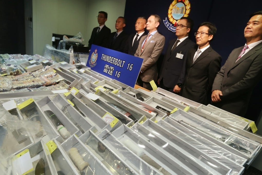 Police in Hong Kong, Guangdong and Macau arrested more than 27,000 people and seized HK$153 million in crime proceeds during the two-month joint operation called "Thunderbolt 16" to combat triad crimes across the border. Photo: K. Y. Cheng