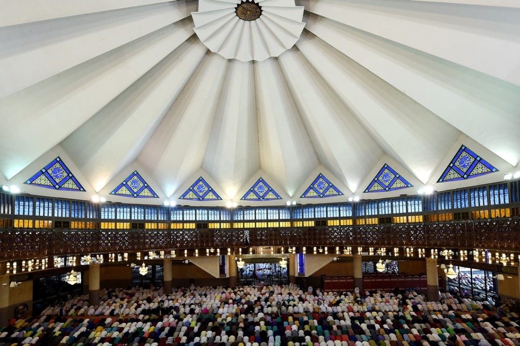The creeping influence of Islam in Malaysia has alarmed many younger people. Photo: AFP