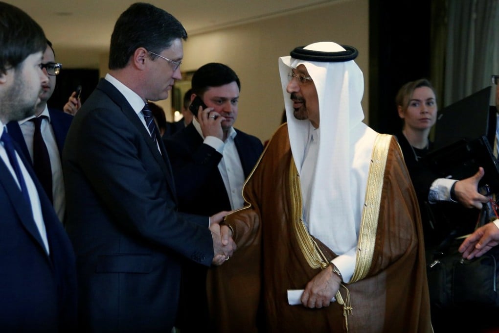 Saudi Arabia's Energy Minister Khalid al-Falih and Russia's Energy Minister Alexander Novak shake hands after a joint briefing in Beijing, China, as an OPEC meeting next week is expected to extend production cuts into 2018. Photo: Reuters