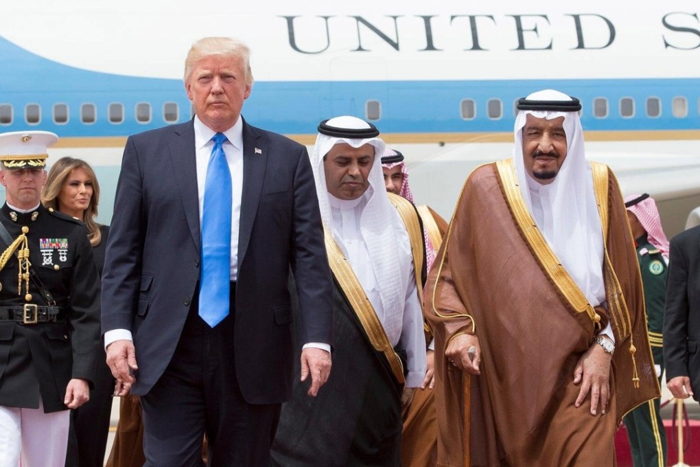 Donald Trump is welcomed by Saudi King Salman (right). Photo: EPA