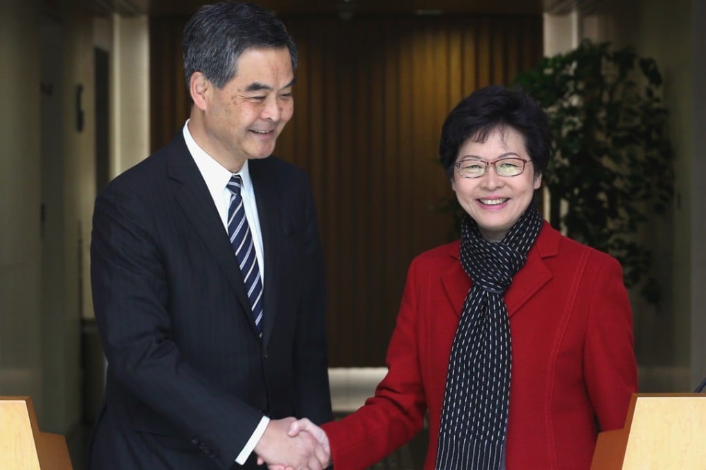 Chief Executive Leung Chun-ying and incoming leader Carrie Lam Cheng Yuet-ngor meet the press in Tamar. Photo: Felix Wong