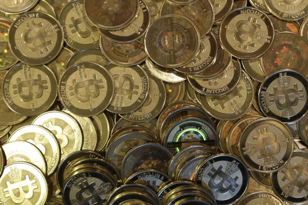 Bitcoin tokens. Its price here reaching 14,180 yuan (US$2,058) per coin on Monday, almost twice its January low value of around 4,092 yuan. Photo: AP