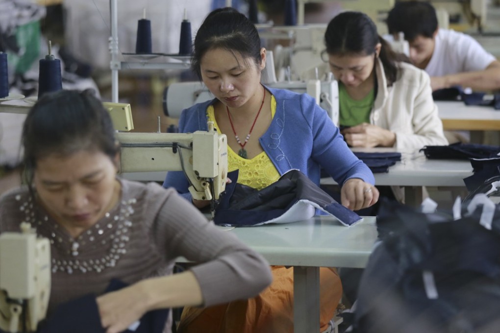 Workers at a factory in Jiujiang, in China’s Jiangxi province, produce clothing destined for the EU.
