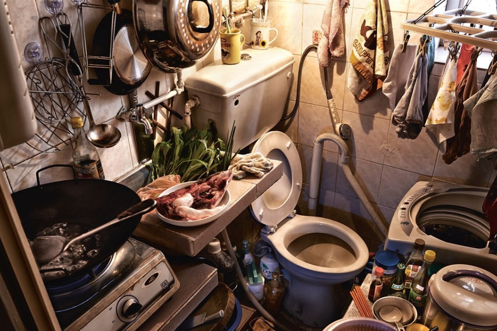 A toilet that doubles as a kitchen, typical in many subdivided flats inhabited by Hong Kong’s minimum wage earners struggling to stay above the poverty line. Photo: SCMP