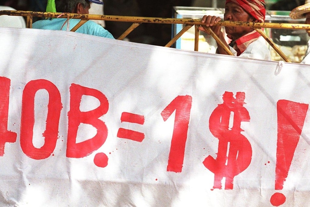 Villagers protest about their plummeting currency. Photo: AFP