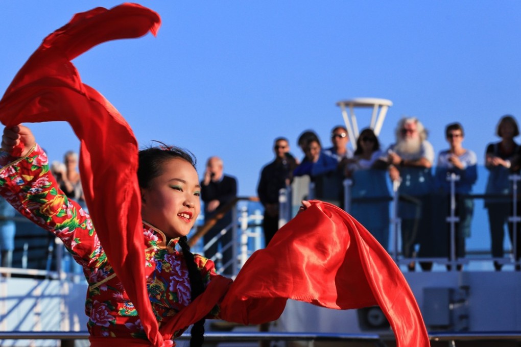 A girl performs a folk dance during the opening ceremony of the “Silk Road Stories” programme on board the Majestic Princess cruise ship in Rome, Italy, on Sunday. Photo: Xinhua