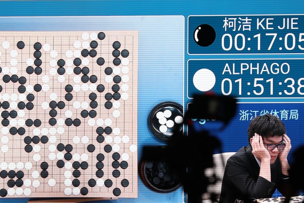 A screen displays the match featuring Chinese Go grand master Ke Jie against Google DeepMind's AlphaGo artificial intelligence programme. The machine won the first of three matches after four and half hours, pulling off several surprise moves. sPhoto: EPA