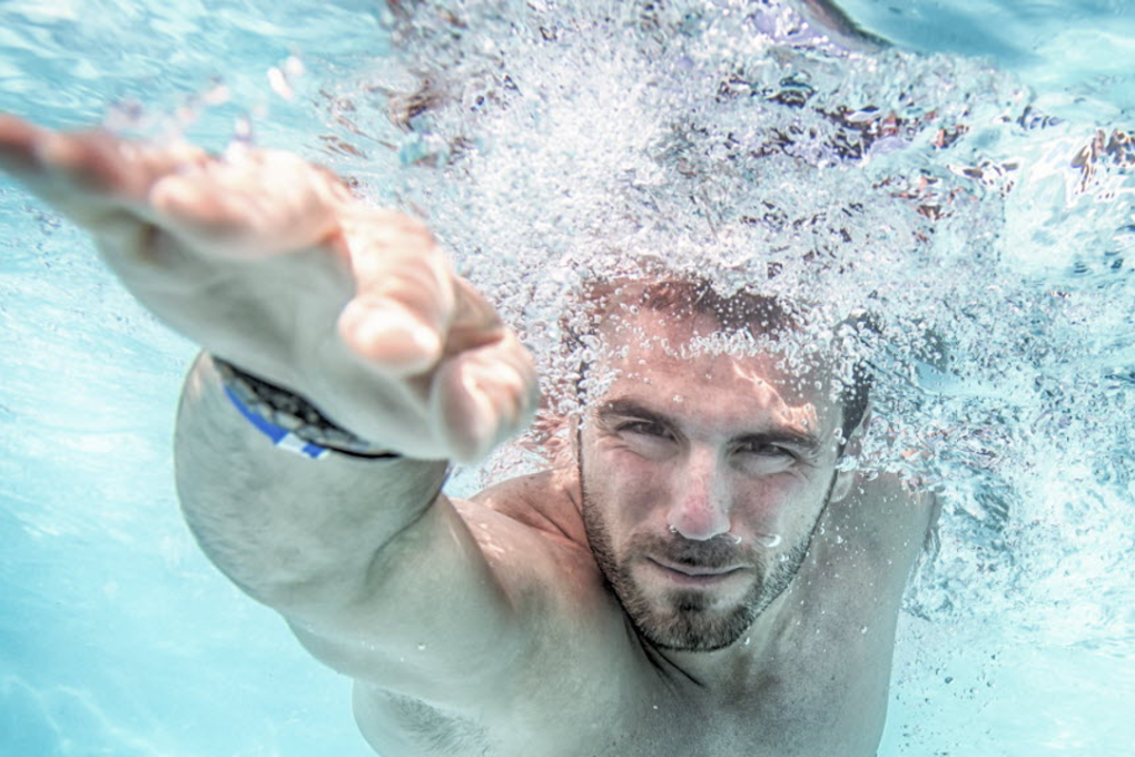 Man swimming in a pool. Photo: Shutterstock