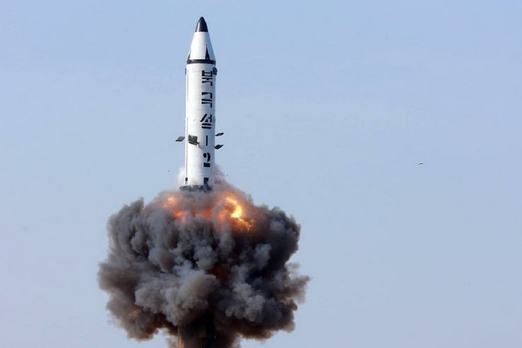 An undated picture released from North Korea's official Korean Central News Agency (KCNA) on May 22, 2017 shows the North Korean ground-to-ground medium-to-long range strategic ballistic missile Pukguksong-2 being launched in a test-fire. Photo: KCNA handout via AFP ”