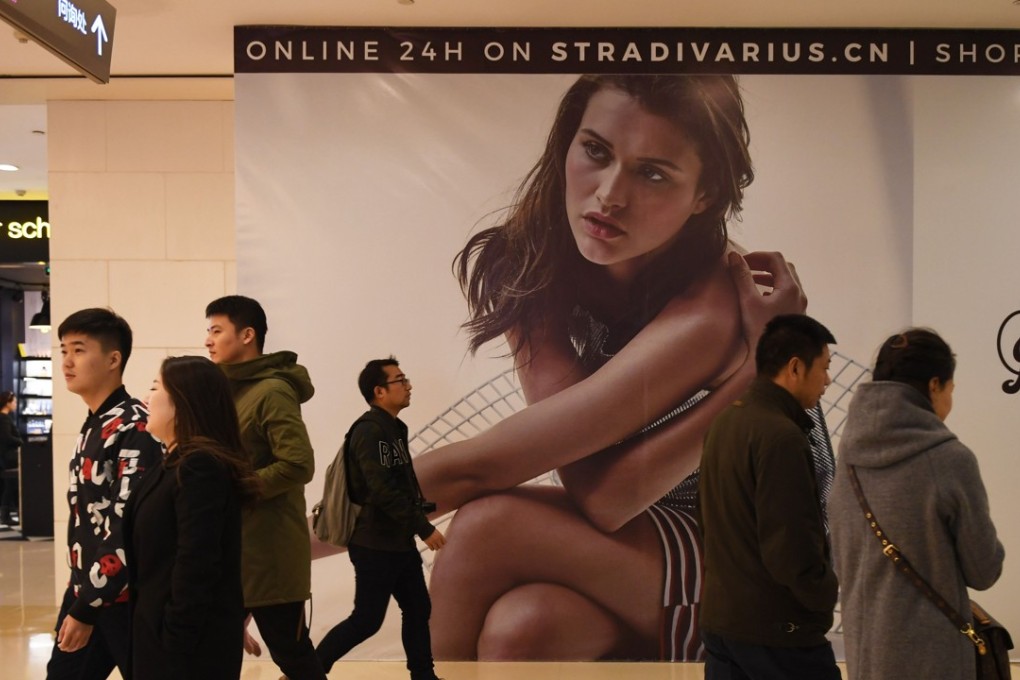 Digitalisation further encourages integration between online and offline retail channels, making store fronts more as marketing and experience shopping platforms. Photo: AFP