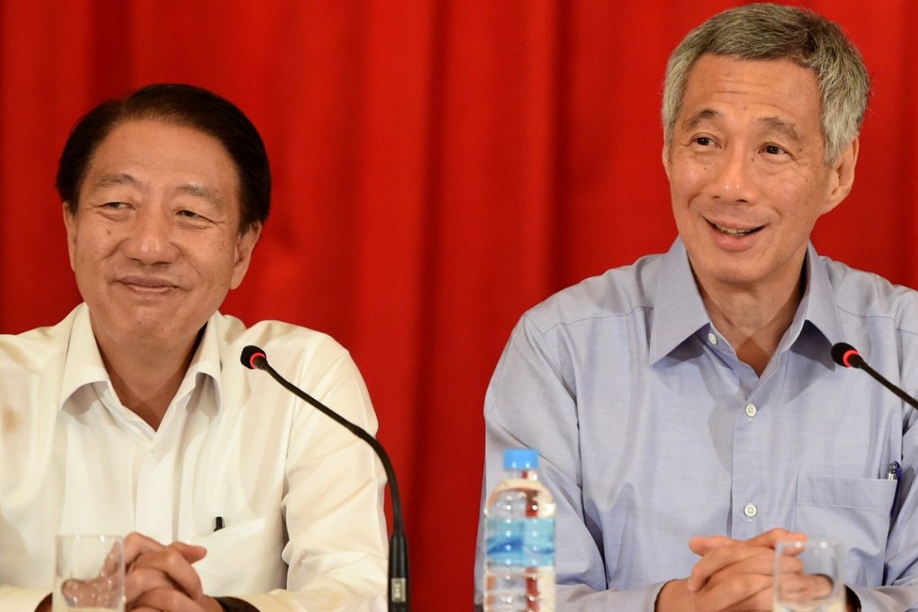 Singapore’s Deputy Prime Minister Teo Chee Hean with Prime Minister Lee Hsien Loong. Photo: AFP